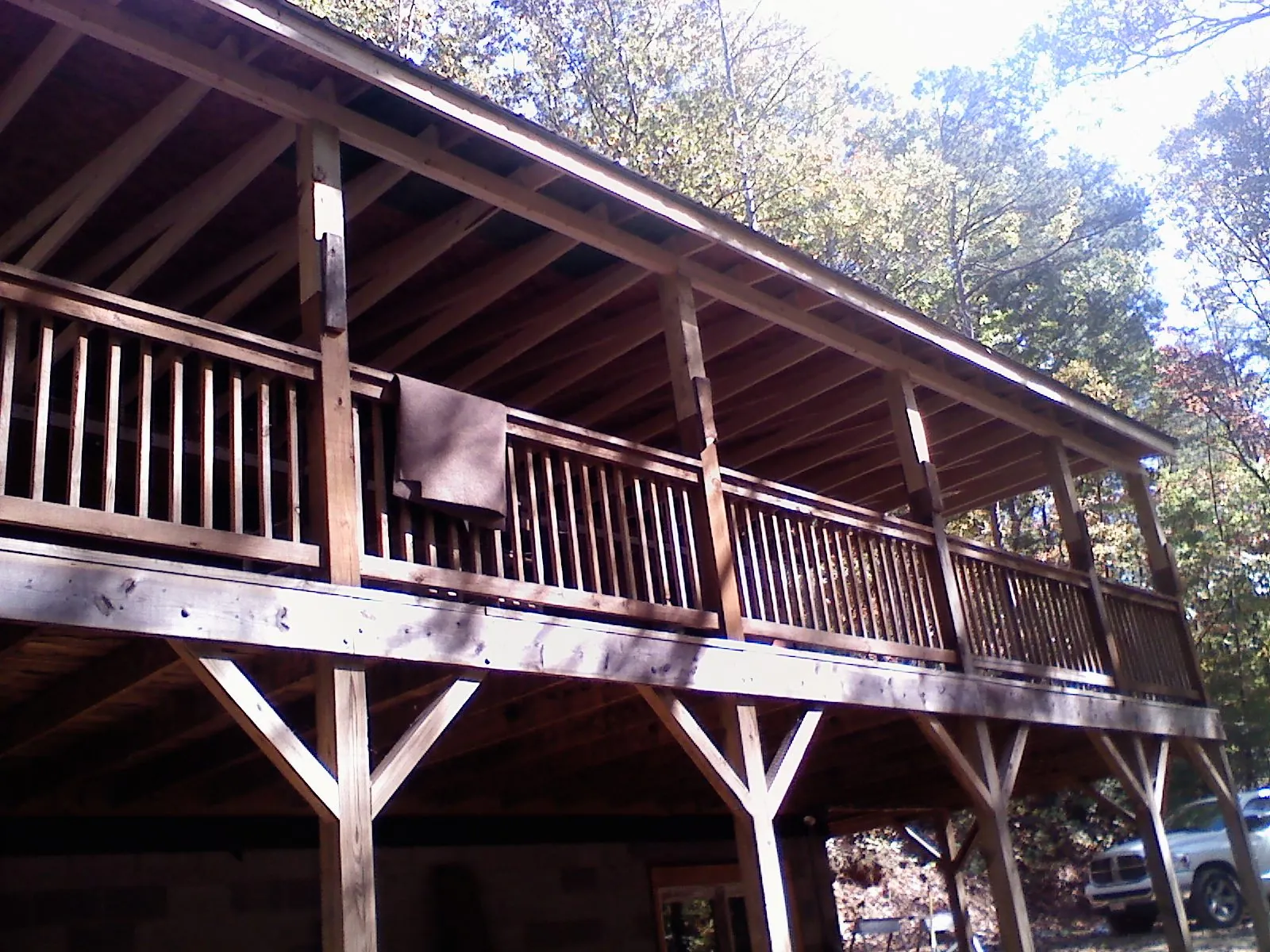 Timber framing under a new elevated porch and deck — Roof Leak Repair in Welch by Roofing Brothers